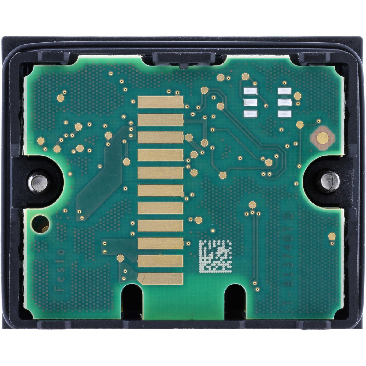 Backside of electronics module showing green microchip on white background.