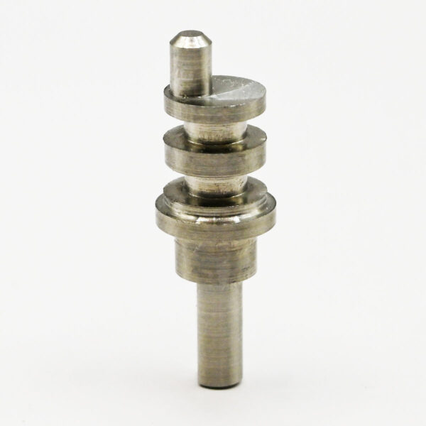 Stainless steel machined part on white background.