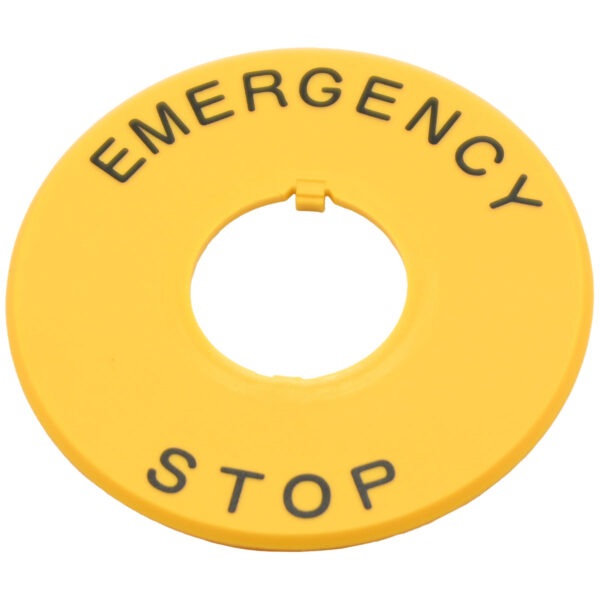 Yellow plastic disc shaped part with center through hole. The part has black text that reads "Emergency Stop". This part is shown on a white background.