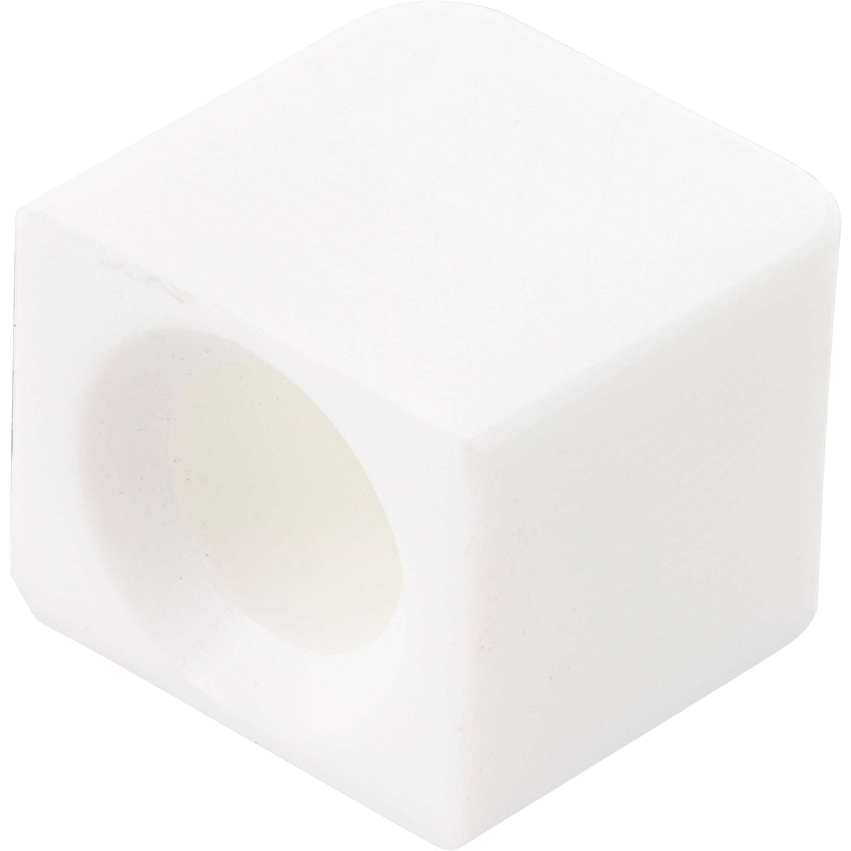 White plastic cube shaped part with center hole shown on white background.