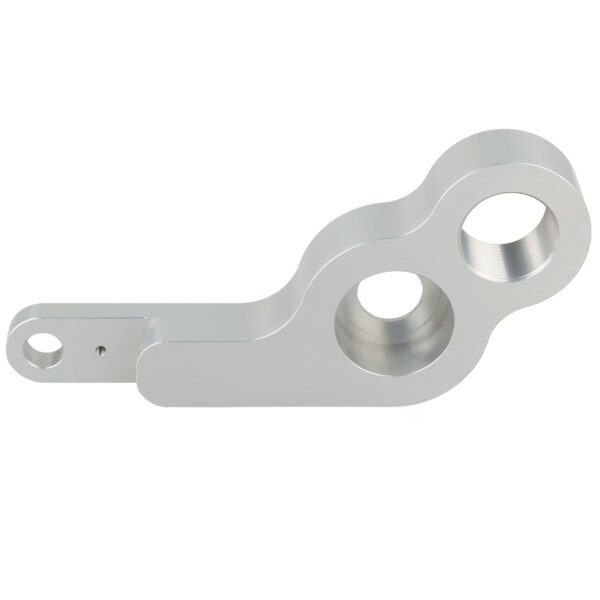 Grey machined 1st op swing arm part made of anodized aluminum on white background.