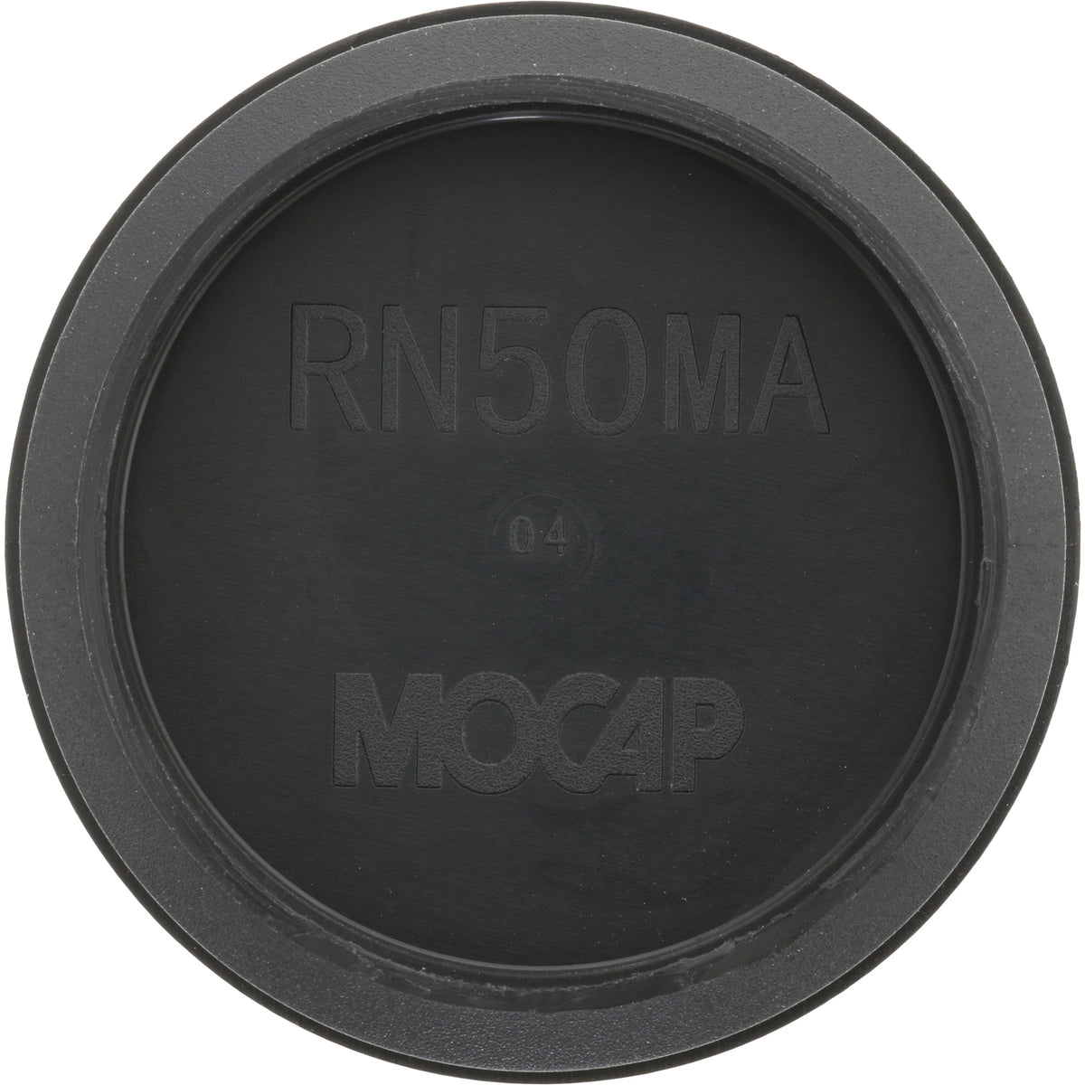 Low profile black plastic disk shaped plug on white background.