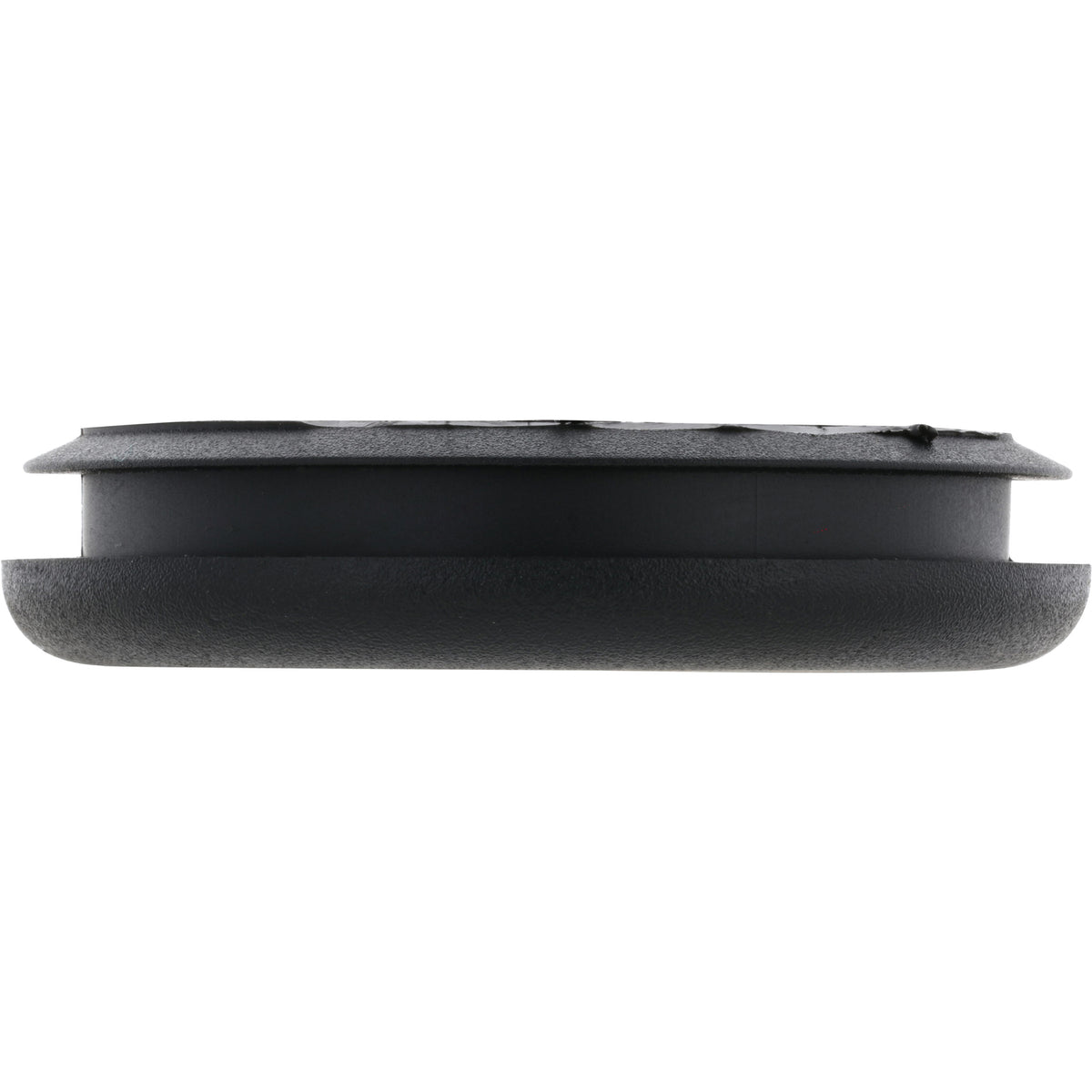 Low profile black plastic disk shaped plug on white background.
