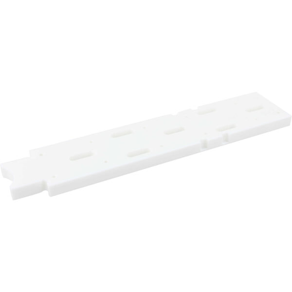 Flat white HDPE machined part with multiple holes cut into it. Part shown on white background.