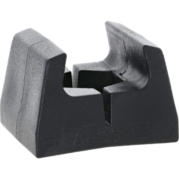 Black acetal rail clip on white background.